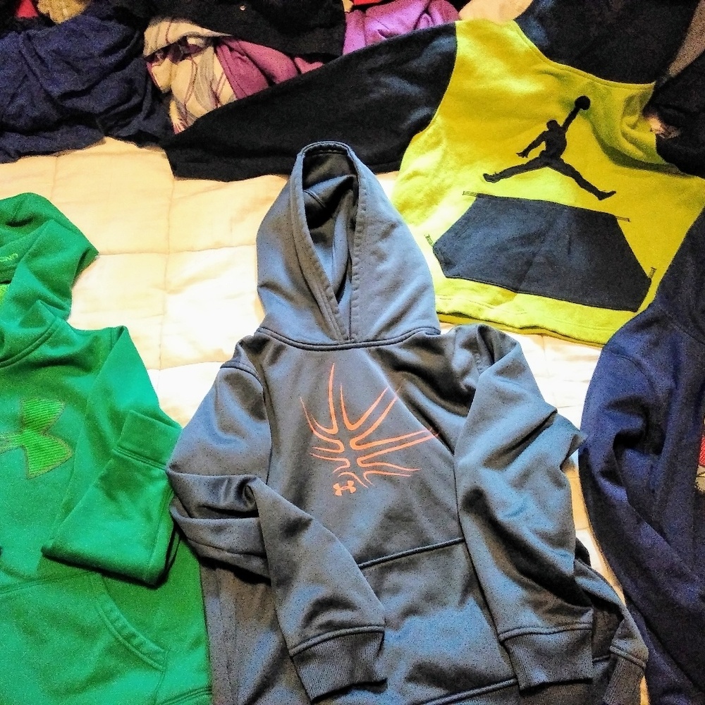 2 Under Armour, 1 Jordan and 1 Nike hoodies
